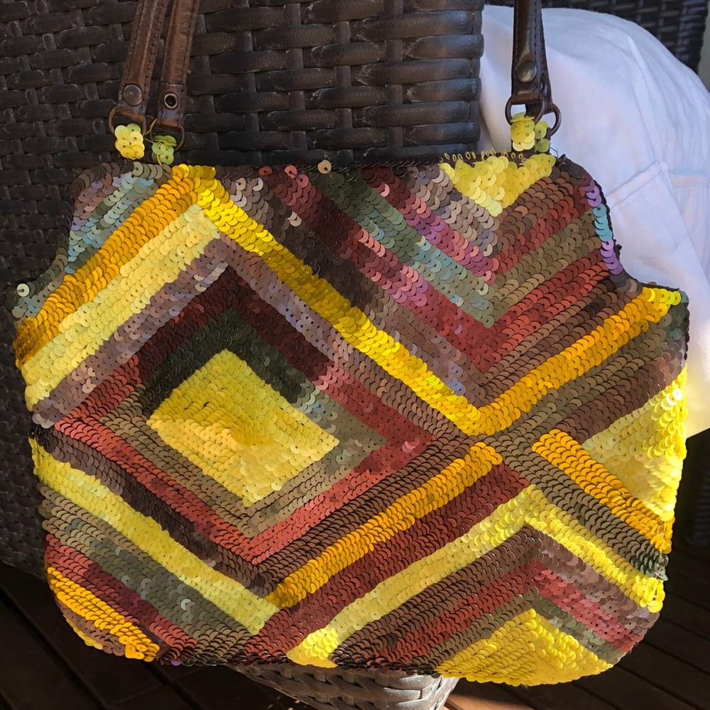 Jamin Puech geometric sequin bag with leather handles.